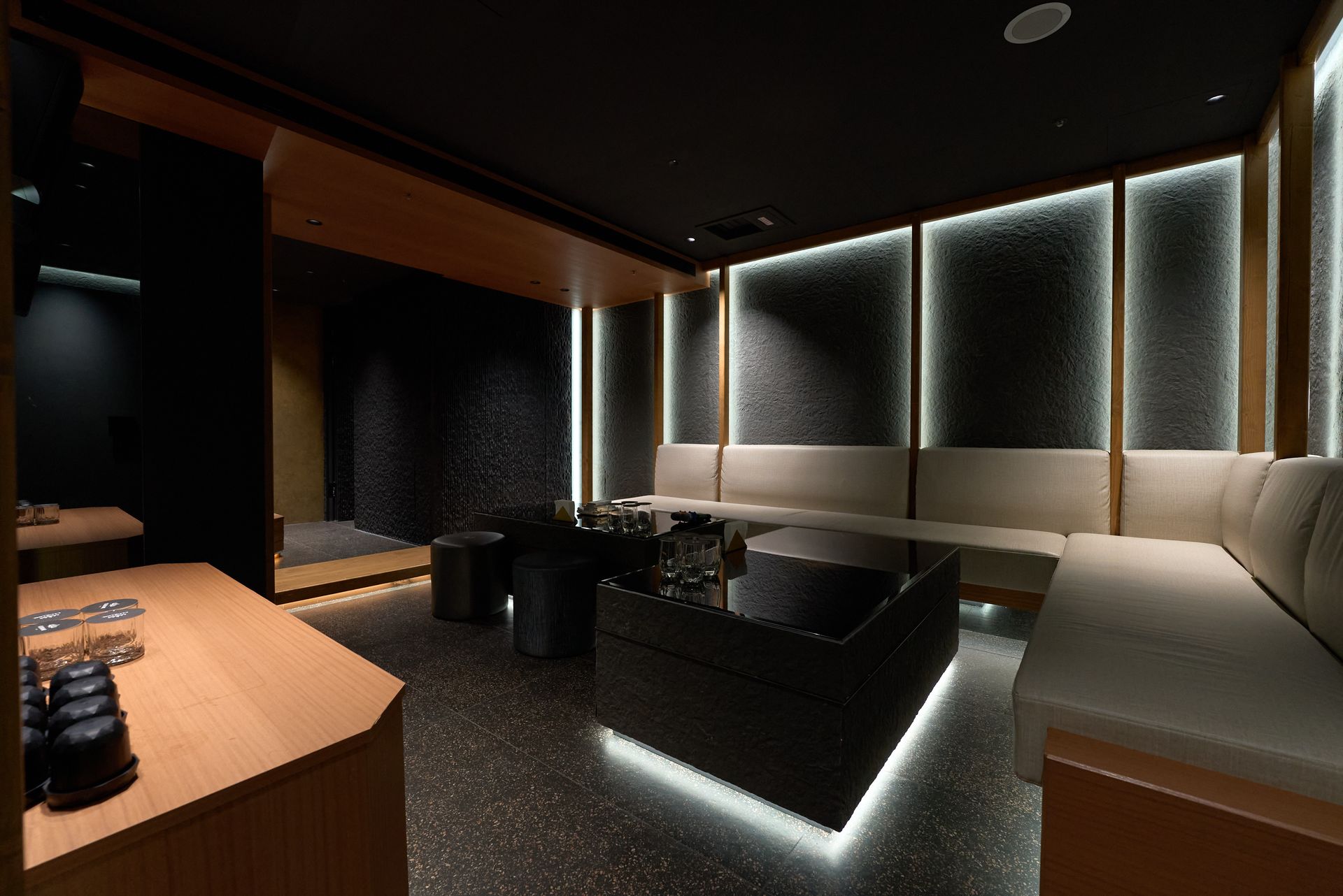 1884 Taipei Onsen Suite — up to 8 guests, Taiwan’s first private bath inside a KTV, wabi-sabi timber finish